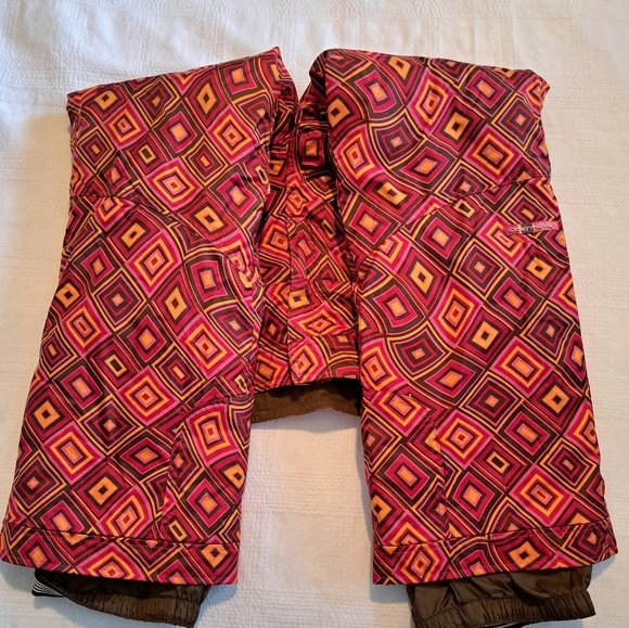 Obermeyer girls size 12 snow pants, diamond pattern orange, red & brown - Picture 6 of 11